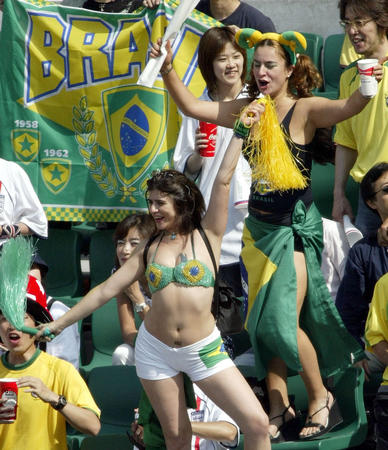 Brazil soccer supporters cheer on their team before the start of a World Cup quarter-final match with England in Shizuoka June 21, 2002